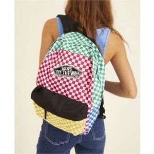 Vans Realm backpack features a vibrant multicolor checkerboard pattern.